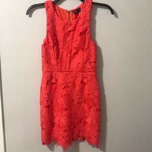 Coral dress with lace cutout detail